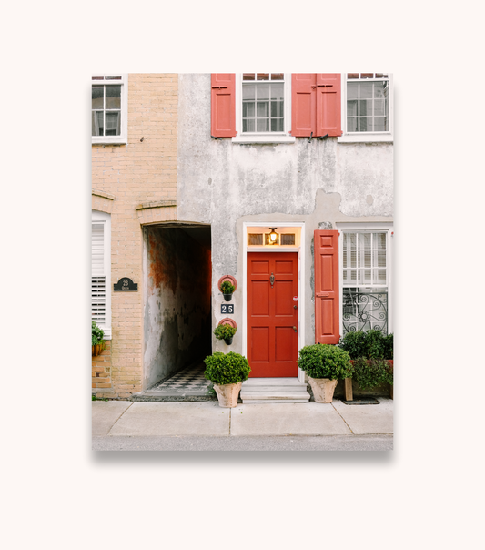 Charleston wall art print featuring a red door and historic Queen Street architecture