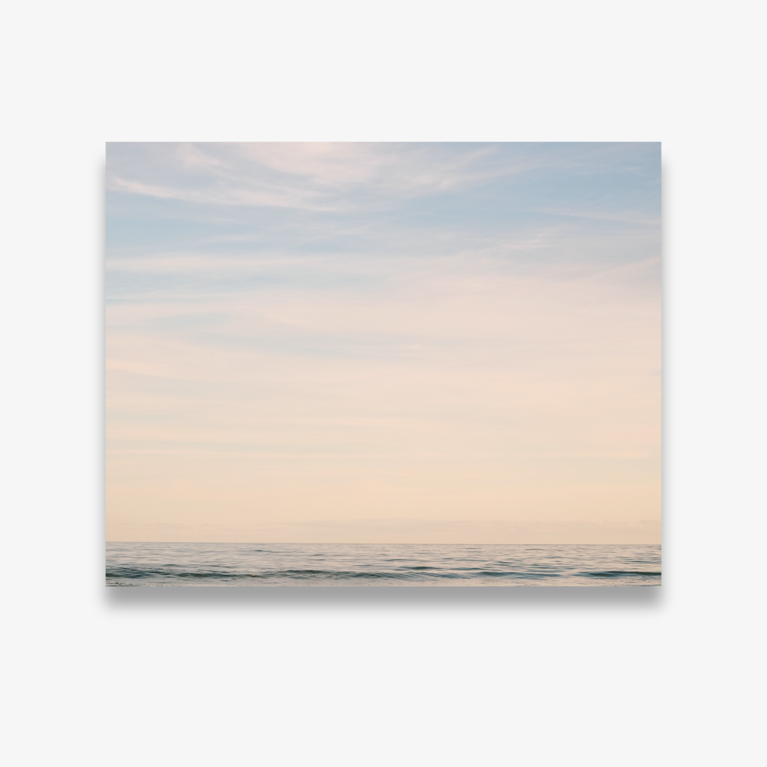 Pastel beach wall art photograph with soft pink and blue tones