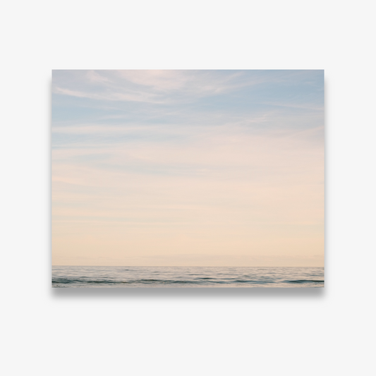 Pastel beach wall art photograph with soft pink and blue tones