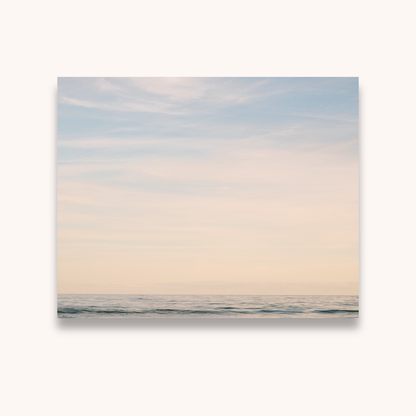 Surreal landscape with gradient sky and water