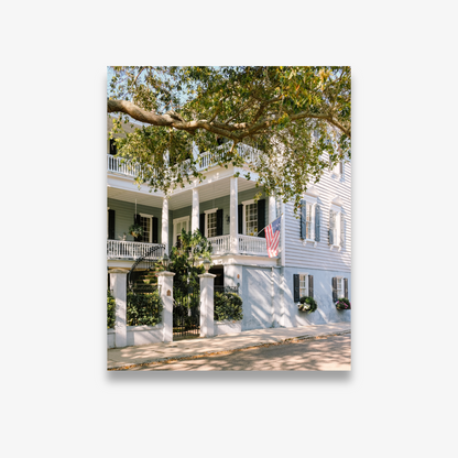 Charleston home with soft blue shutters and door – coastal photography print by Kelsey Bird