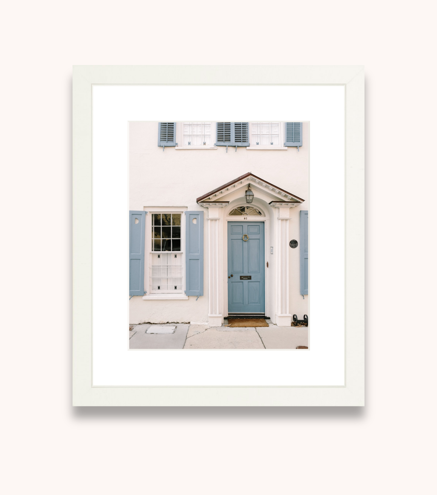 Framed Charleston wall art with blue door and crescent moon detail
