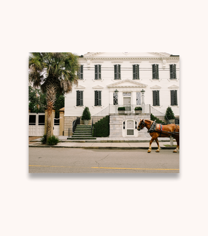 En Route Charleston photography print featuring a horse-drawn carriage downtown 