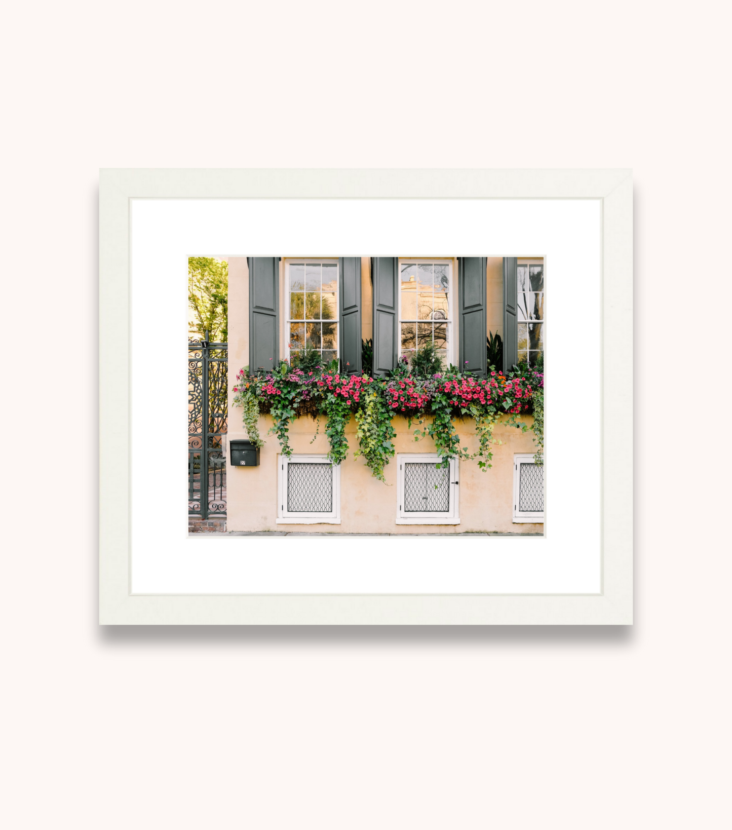 Framed wall art mockup of “Triplets,” a Charleston architecture print with three repeating windowboxes.